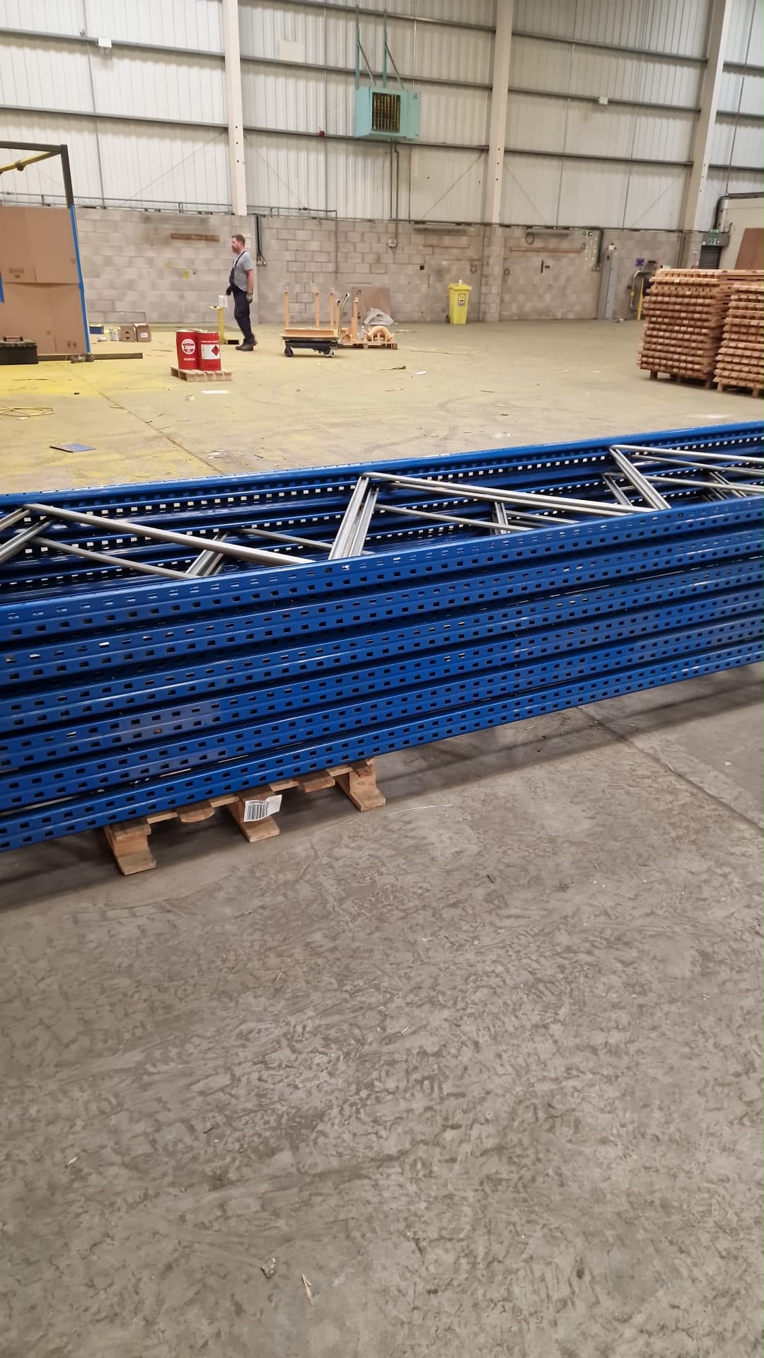Heavy-duty pallet racking bays before dismantling and relocation